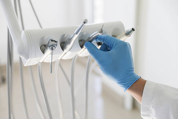 Professional Tooth Extraction technician working in Marion County County, IN